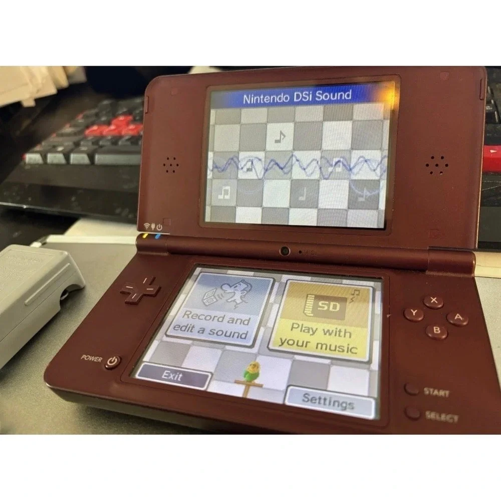 Nintendo DSI xl with three game bundle